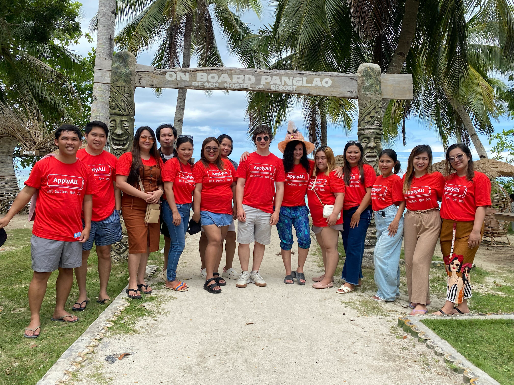 ApplyAll teammates at a beach resort in the Philippines