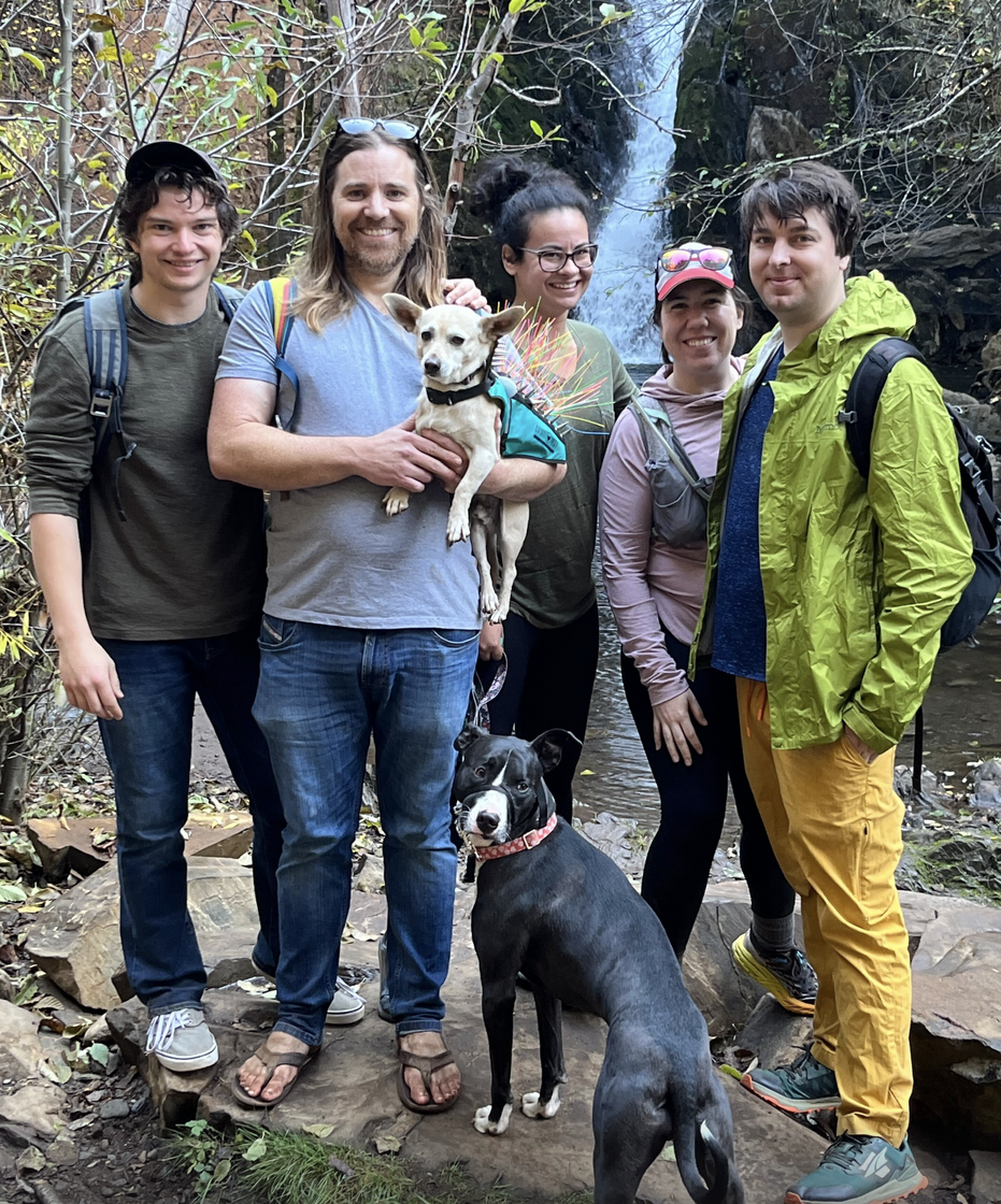 The ApplyAll team on a Lake Tahoe hike with company mascots Jojo and Tater Tot